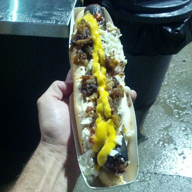The Crazy Kiwi Duncan Dog! An absolutely enormous foot long hot dog slathered with grilled onions, cole slaw, bacon, cheese sauce and hot sauce! Go Crew!
