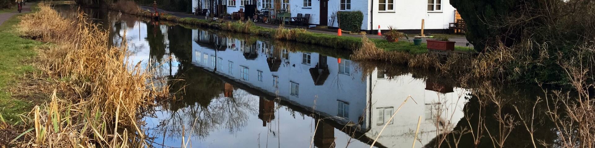 Cottage reflections in the Trent and Mersey Canal near Barlaston.