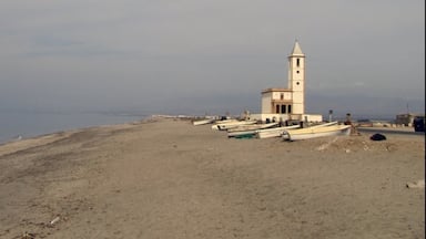 The most beautiful church n this deserted fisherman's beach with the boats up on the shore and no one in site - so very peaceful and beautiful I fell in love there and then.