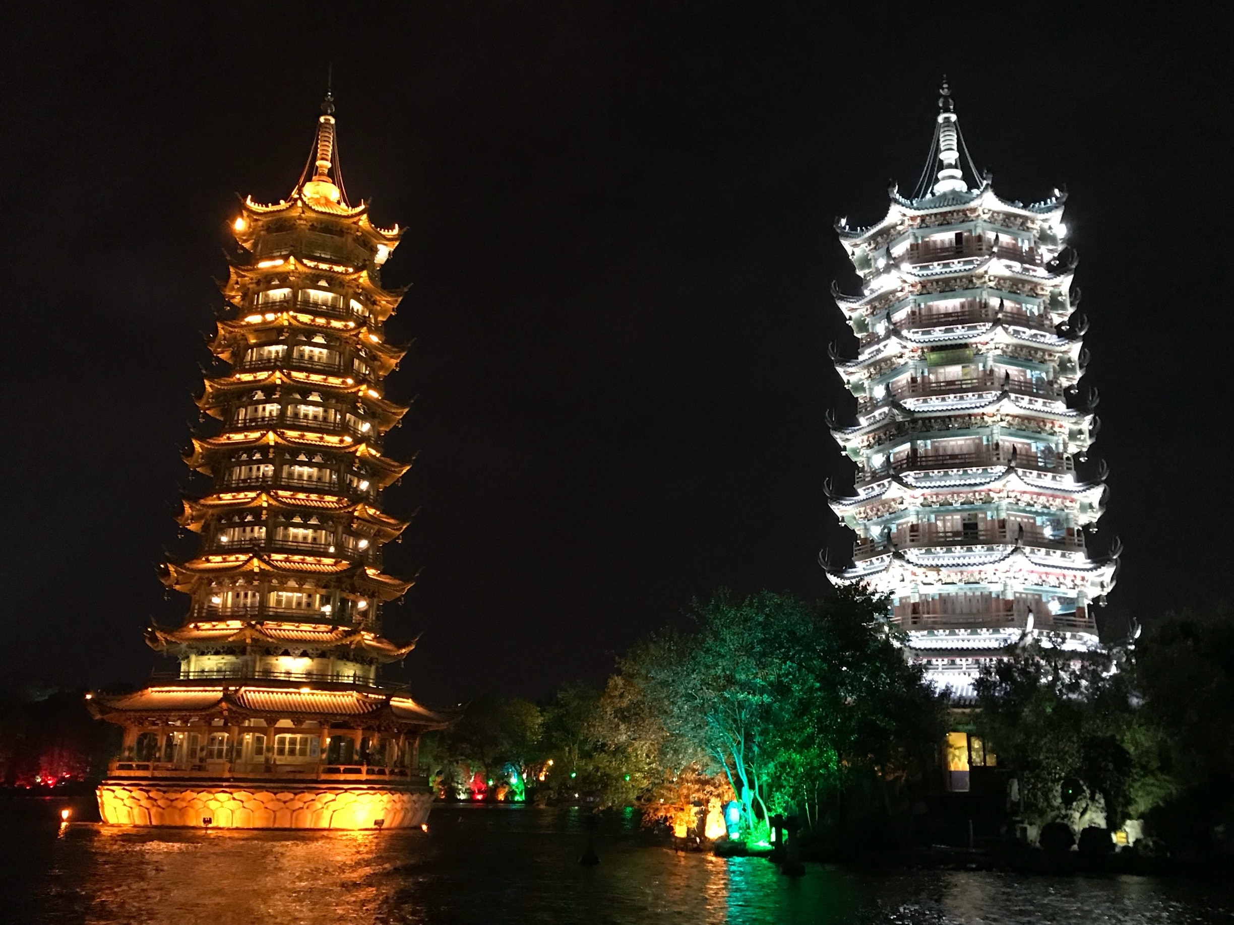 Located in Guilin, Two Rivers and Four Lakes Scenic Spot refer to the landscape - Sun and Moon Pagodas - Mulong Pagoda was built by imitating Longhua Pagoda in Song Dynasty in Shanghai.