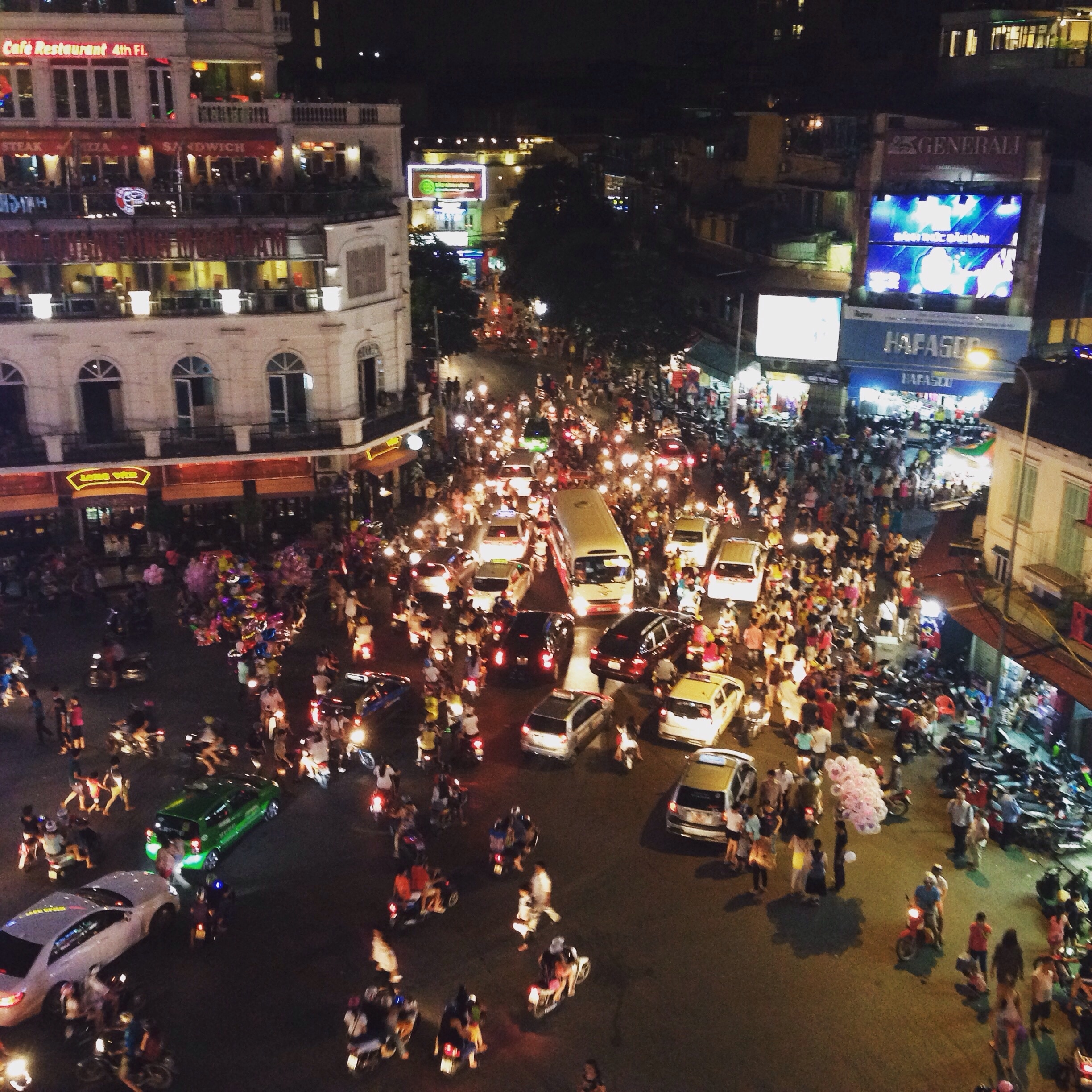 The narrow streets and swarms of motorbikes in Hanoi's Old Quarter can be both charming and overwhelming. The City View Cafe located near the NW corner of Hoan Kiem lake offers spectacular views of the chaos below. #hanoi #traffic #hoankiemlake #oldquarter #vietnam