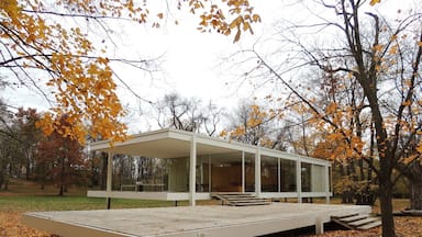 This unique weekend home built by famed German architect Mies van der Rohe (he coined the phrase 'less is more') for Dr. Edith Farnsworth comes with a famed relationship turned sour between doctor and architect.  You know what they say about glass houses. Enjoy a tour of this landmark via my blog at http://www.aplacecalledroam.com/home/farnsworth-house-a-modern-minamilist-dwelling. 