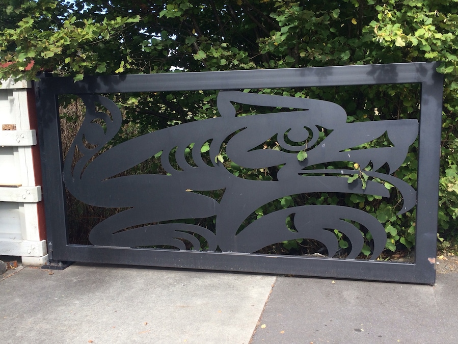 Believe it or not, this is the gate to the refuse and recycling pen for the Community Center of the Jamestown S'Klallam Tribe. Sure beats a slatted cyclone fence.