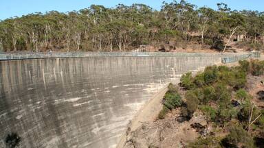 The Whispering Wall is a dam in the Barossa region of South Australia. If you whisper something from one end, they can hear you at the other. 