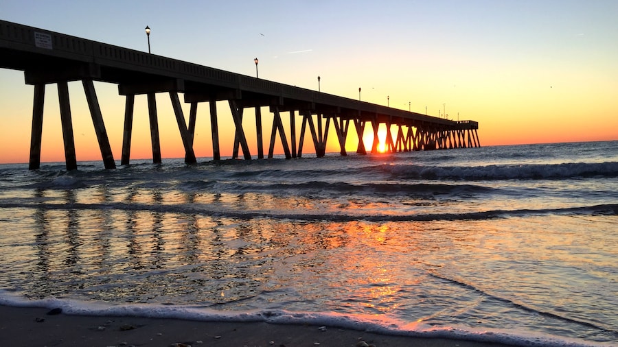 This pier makes for great sunrise photos. $2 to walk out onto it but totally worth it. Lots of avid fishermen to entertain you AND they sell beer and other beverages to carry out there with you. The Wilmington/Wrightsville Beach is a great area to visit with numerous excellent breweries and many great restaurants.