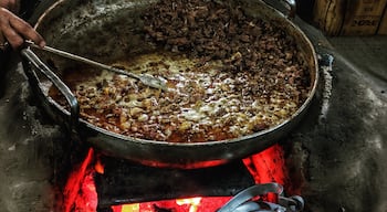 Very few places can maintain the consistency in their quality of food for more than a century. One such place is this one which not only gave #kolkata many of its firsts, but also ensured that clients stay addicted to their food. The famed mutton chaap, first made by them, is being cooked in their kitchen in slow charcoal fire #GoodEats