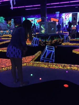 Monster mini golf is an indoor glow-in-the-dark miniature golf place and it's appropriate for everyone of all ages! This place was super fun, and very inexpensive.
