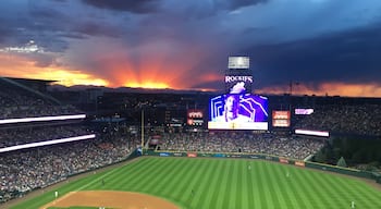 Coors Field, home of the Colorado Rockies is a fantastic venue for baseball. Get a seat along first base for spectacular views of the Rocky Mountain front range and sunsets. Sit along the third base for the most shade. Don’t miss a mile high photo op at the 20th row in the 300 section marked by a row of purple seats. #milehighcity #coorsfield #denver #LifeAtExpedia