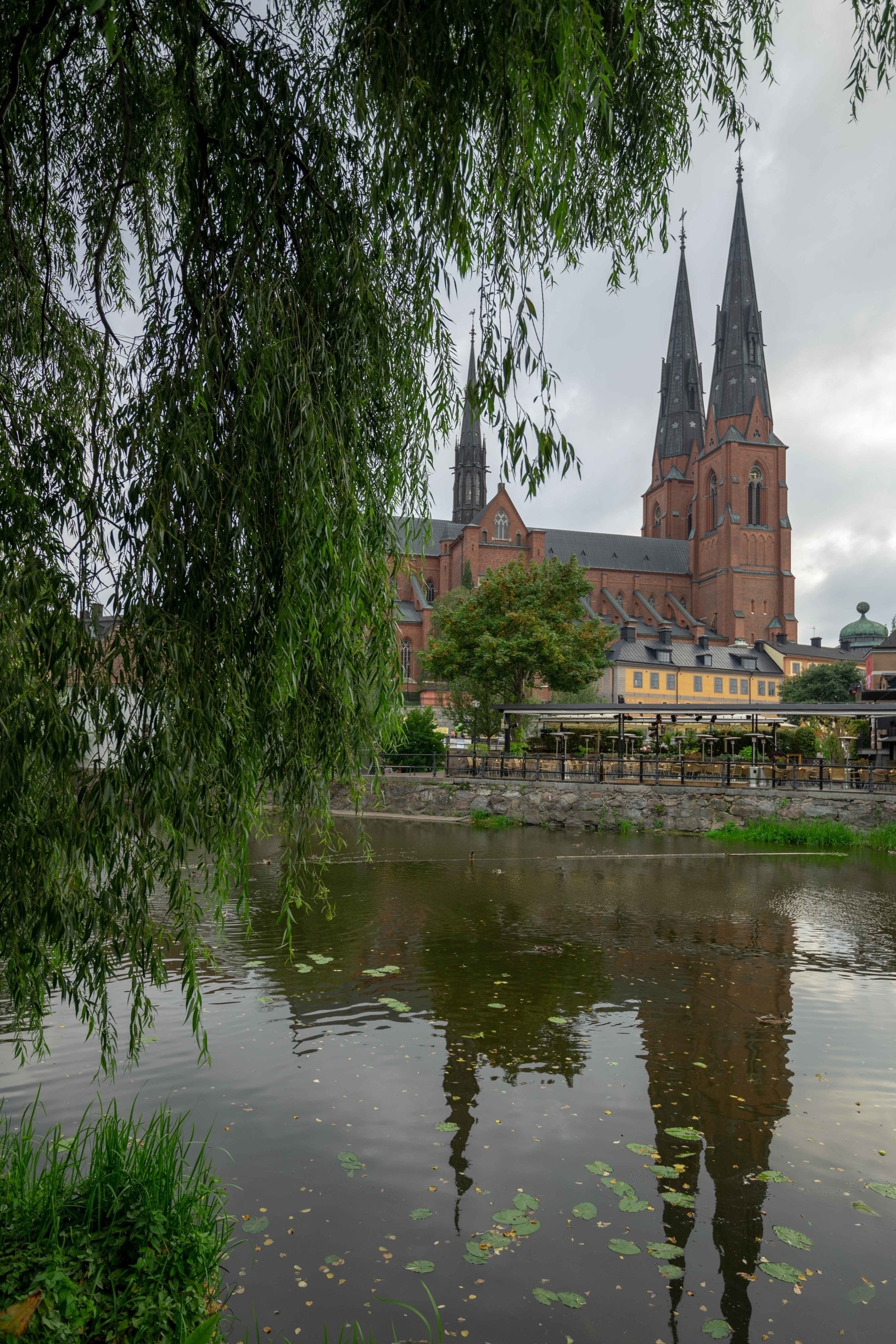 View of Uppsala Cathedral (Domkyrka), consecrated in 15th Century, from River Fyris.