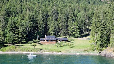If you're on an Anacortes ferry to the San Juan Islands, watch for this house on the starboard side as you round Blakely Island; the scoundrels living there may decide to launch a cannon shot your way!