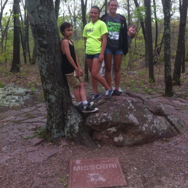 Taum Sauk Mountain in located in the St.Francis mountain range of south/central Missouri. It's also the highest point in Missouri. My kids are standing at the spot where the actual marker sign in 
