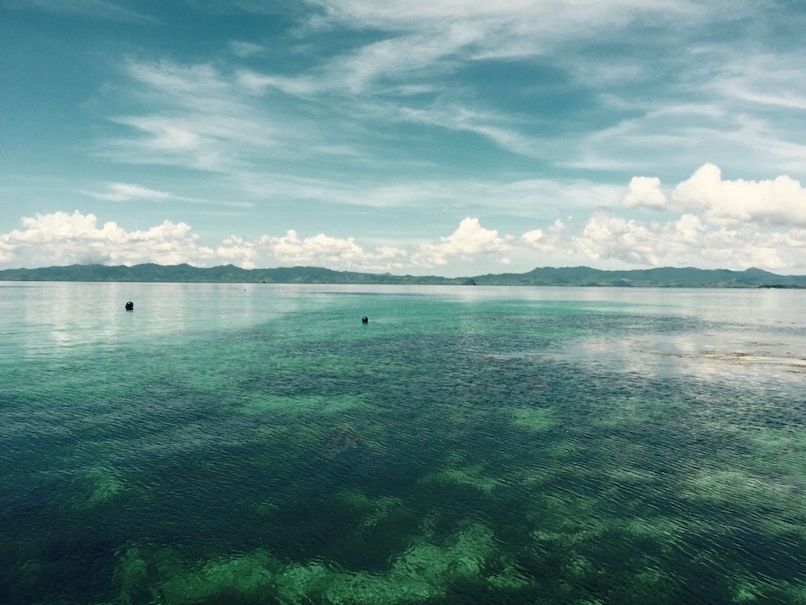 View from our water villa at El Nido Apulit Island Resort, Phillipines...don't know how but the sky always looks like this, clouds are on the horizon and sky will have shades of blue... Combined with pristine water is truly beautiful