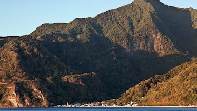 The tiny village of Soufrière, with Plat Pays Mountain rising in the background.  With such steep, forested mountains covering most of the island, it's no surprise that Dominca has remained largely untamed.

Note: Photo taken from Scott's Head at sunset.