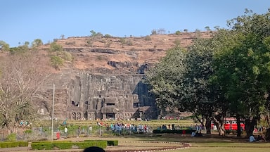 Built during 600 to 1000 CE, Ellora Caves lie in the Sahyadri hills in Aurangabad and is a 2-hour drive from the Ajanta Caves. The Ellora Caves comprise Hindu, Buddhist and Jain temples and over a 100 caves with only 34 open to the public excavated from the basalt cliffs in the Charanandari hills. Ellora Caves served as lodgings to the travelling Buddhist and Jain monks besides being a site for the trade route. There are 17 Hindu caves, 12 Buddhist and five Jain caves with deities, carvings and even monasteries depicting the mythology of each religion.