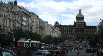 Wenceslas Square
Here We began our journey to the Karls- Bridge. (The Sun just rises, streets a little dark of shade) 
We left our Car outside Prague and went underground (Subway Chodov-Shopping Center) to Můstek - A subway station Wenceslas Square.
The traffic in the city is really a mess.
It's a relief if You already are at a Hotel here but We came from Pilsen by Car this time.

Less a square than a boulevard, Wenceslas Square has the shape of a very long