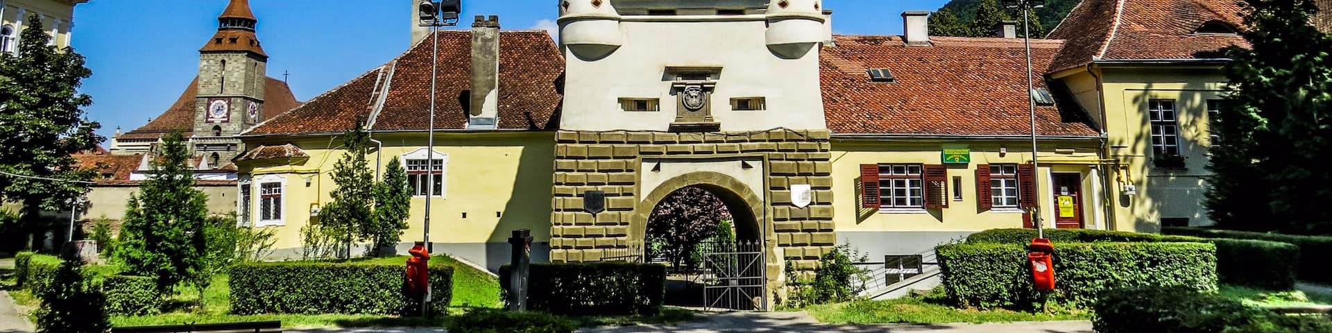 Catherine's Gate in Brasov, Romania. It was built by the Tailors’ Guild in 1559 for defensive purposes instead of an old gate destroyed by the flood in 1526. It is named after St. Catherine's Monastery that was situated there in former times. It is the only original city gate to have survived from medieval times. In fact the central tower is only a part of the original gate. Documents talk about the existence of a wooden structure which was demolished in 1827. The original structure can be seen at the Weaver's Bastion where the large model of Brasov in 1600 is displayed.