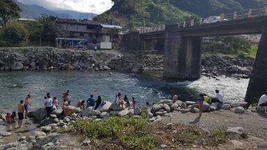 Locals taking a break from the climate. Rio Verde, Ecuador