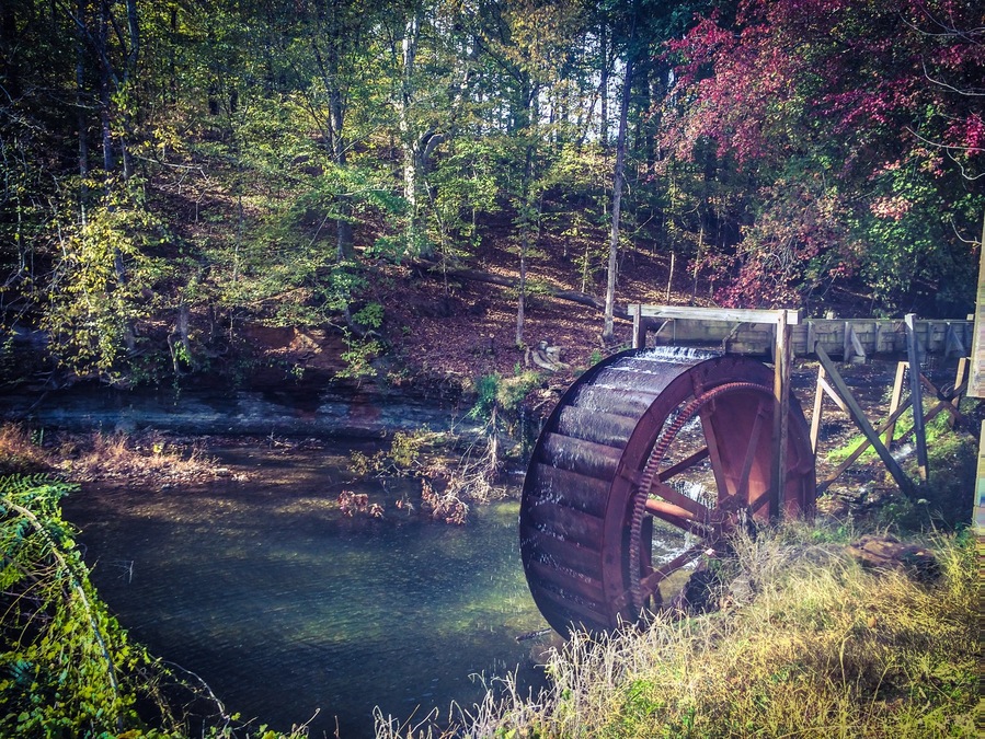 Grady's Mill, water wheel still turns and is located beside a small waterfall.