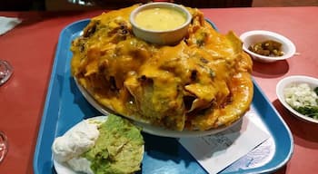 Really fun place! Food is good and inexpensive. These are the "Monster" Nachos, it will feed a crowd. #FoodieFinds