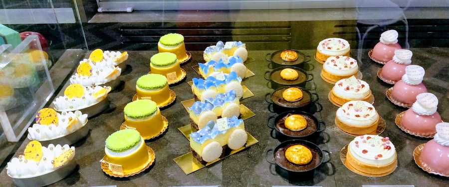 Colorful pastries displayed in a shop on Magazine Street, New Orleans.