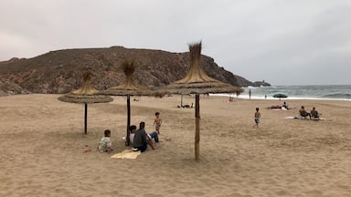 Aftas beach in Mirleft Morocco is a nice size beach cove with a few small beach cafes (only one was open the day we went) and a few surf rentals and beach hotels. #morocco #mirleft #aftas #aftasbeach #moroccanbeaches #moroccantravel #travel #flashpackingbarbie #africa #northafrica
