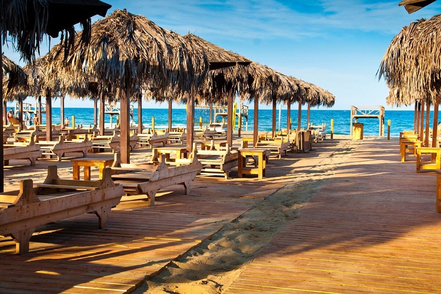 Proud of this place is an unique beach located in Sicily exactly in Catania city, there you can feel like somewhere else but when you realise that you have a volcano Etna view while swimming you will be impressed #BeachTips #catania #Sicily #italy #beach #sand #summer