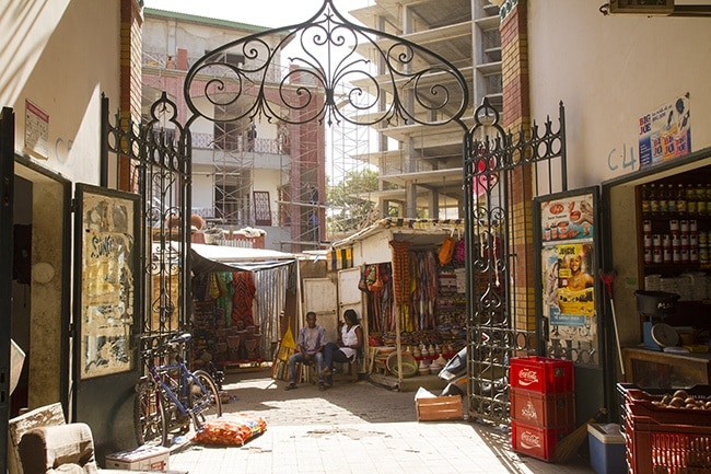 This is a must visit, one of the best of Dakar`s markets! In a beautiful circular building the fish traders has their place in the center. Then comes butchers in the next circle, vegetable and fruit dealers outside there together with florists. Outside the building you will find typical African souvenirs such as jewelry, masks and sculptures. 
Read more: http://www.travelwithallsenses.com/shopping-dakars-markets/