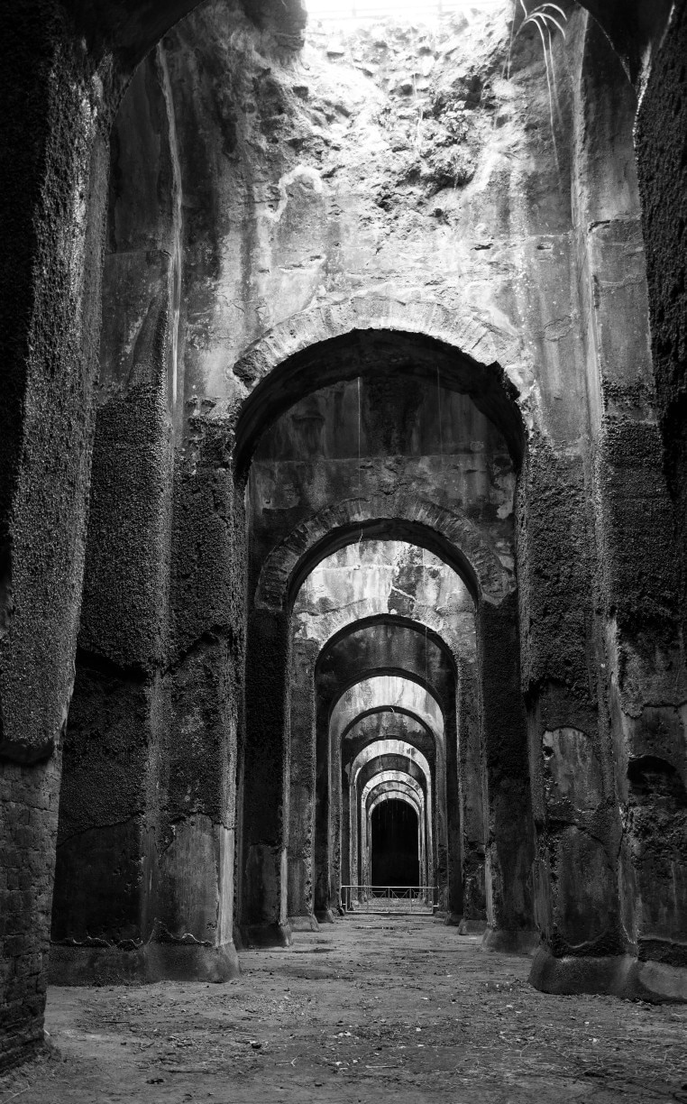 The Piscina Mirabilis was a freshwater cistern on the Bacoli cliff at the western end of the Gulf of Naples, southern Italy. One of the largest freshwater cisterns built by the ancient Romans, it was situated there in order to provide the Roman western imperial fleet at Portus Julius with drinking water.