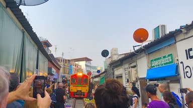 This is Maeklong Market held in front of Maeklong Railway Station. It is held on tracks.
Every time the train passes, people put away their tent and then set up again.
#Thailand