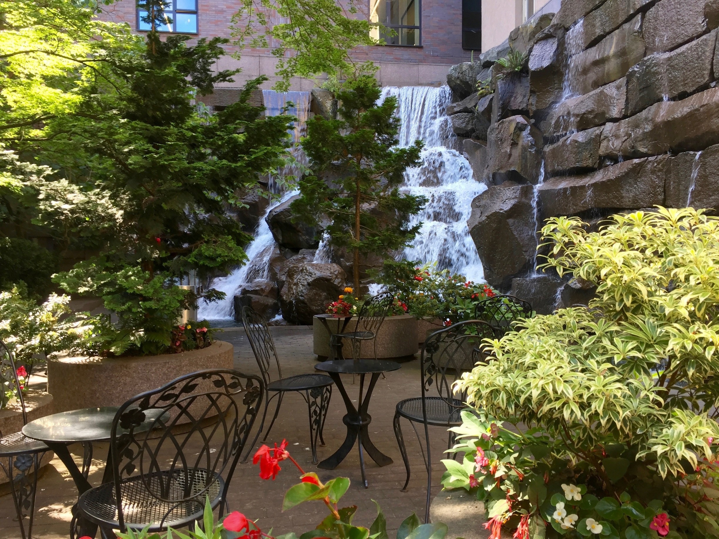 A beautiful waterfall and sitting area in Pioneer Square, marking the location of the original UPS building. 