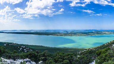 Pano view from Kamenjak of Vransko Jezero and Adriatic sea