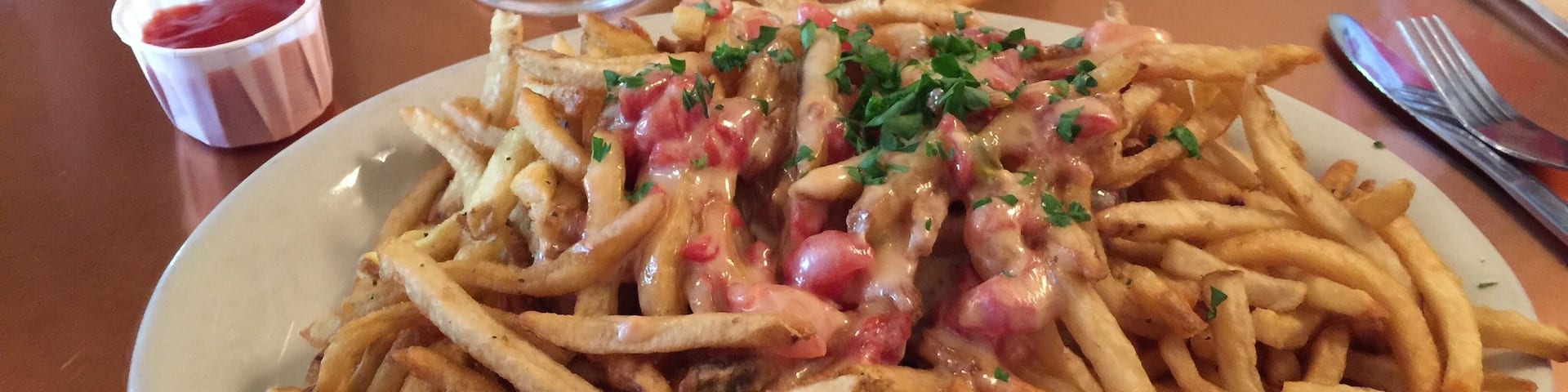 A must stop when in Wichita, similar to Springfield's notorious horseshoes the haystack is a phenomenal calorie packed monster of a dish. Get it with Classique, an excellent saison beer by Stillwater!