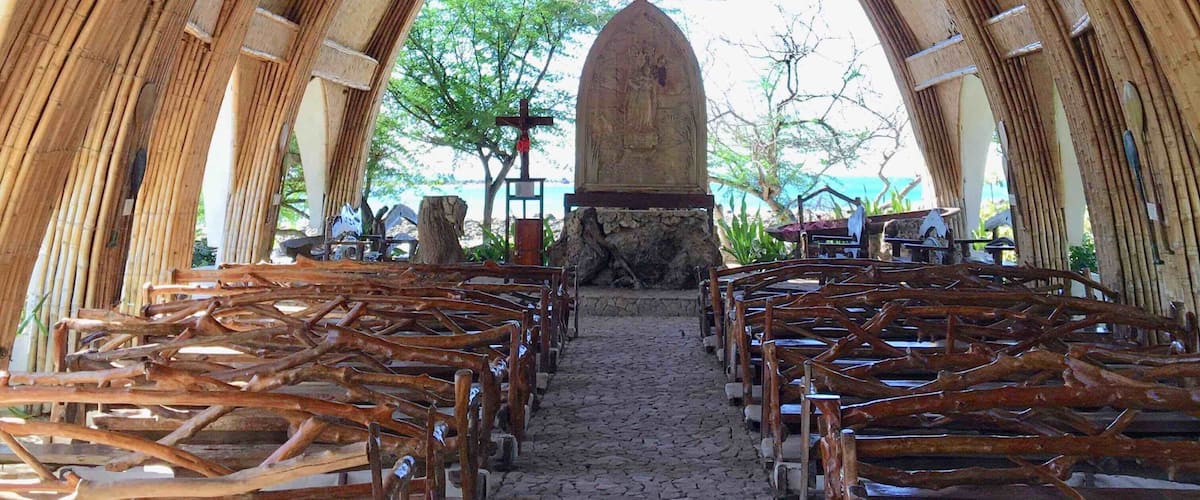 This is a Chapel overlooking the Beach of Badoc, Ilocos Norte(Philippines). It was built for tourist to come visit the place, along the beach are floating cottages for everyone to stay, this photo was taken during my vacation last Dec.10,2018. La Virgen Milagrosa means The Miraculous Virgin Mary. #Perspectives Photo Contest