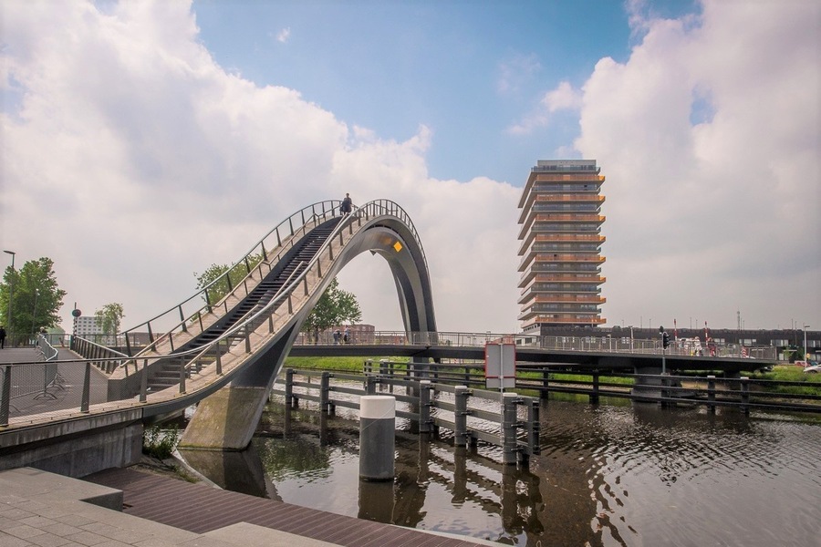 Purmerend has the coolest bridge that I ever crossed. Being in Holland the bridge is designed for the many modes of transportation, feet, bikes and boats.