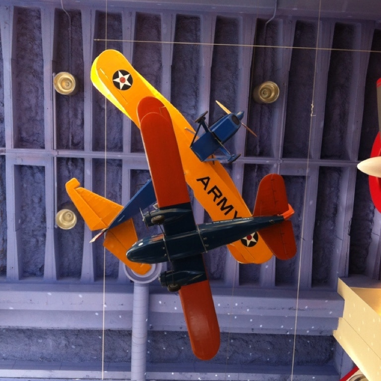 From the basement, looking up, a dogfight in the kids museum...