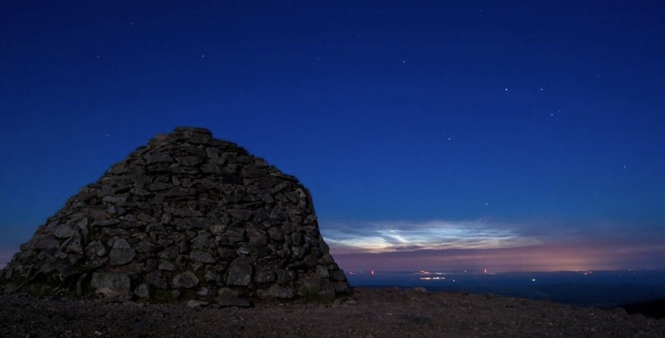 Looking over to Minehead in the early morning with a rare Noctilucent cloud phenomenon 