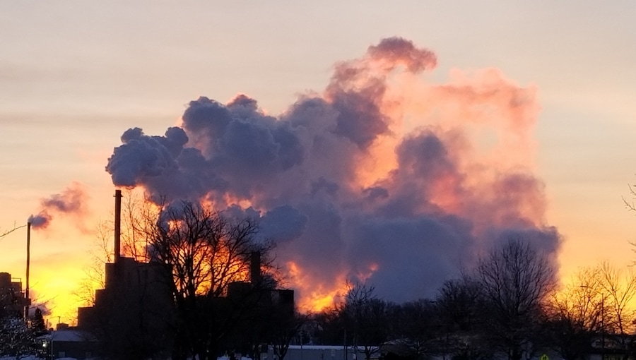The sun rising behind the steam from the local paper mill resulted in some beautiful colors this cold winter morning.