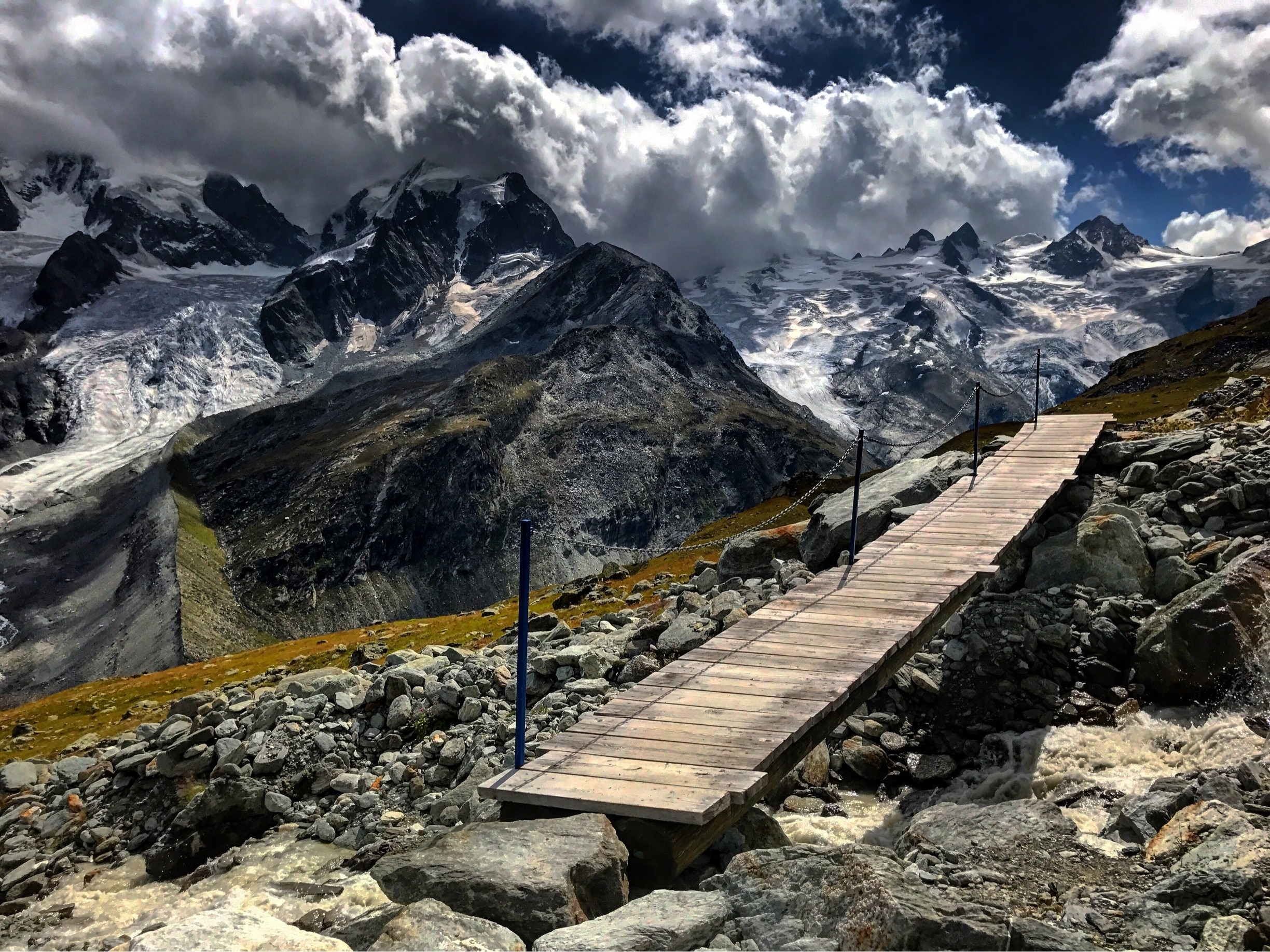 The hike from Corvatsch Station to the mountain hut Chamanna Coaz is just over 5.5 miles one way and provides uninterrupted views of mountains, glaciers, waterfalls, and lakes along the way.  #mysummervacation #lifeatexpedia #hiking #mountains #Switzerland