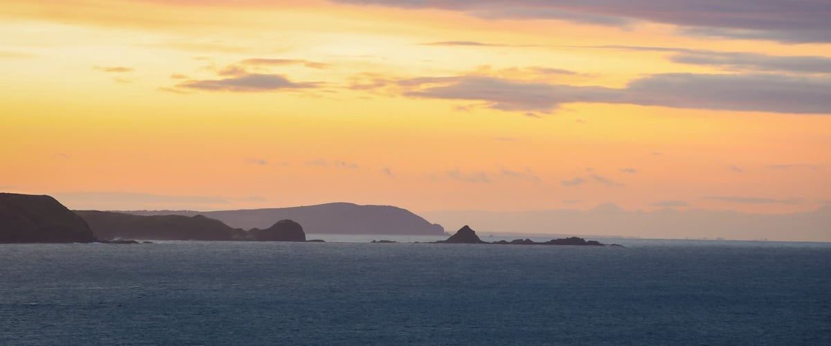 Sunrise at Sunderland Bay where the little penguins live. Looking towards Woolamai with Pyramid Rock in the mid ground.