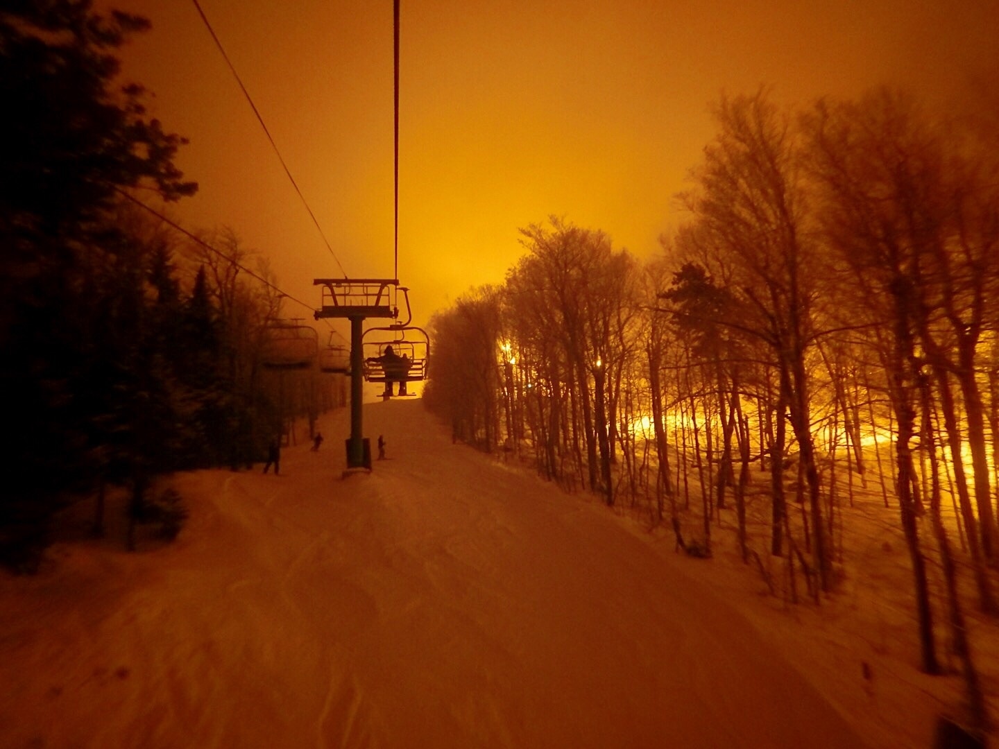 Some of the best night skiing in the eastern part of the U.S.  Lights radiate off of low hanging moisture rich clouds.