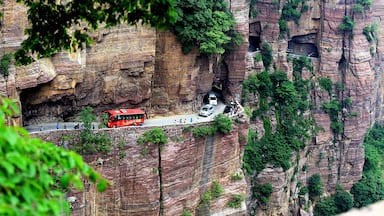 #GuoliangTunnel Road is one of the most famous tunnels in the world,it’s located high in the Taihang Mountain of the Henan Province,China. The road is narrow and steep, very dangerous but amazing ,especially in the wet conditions.Now, the tunnel is not only a way for the villagers connect to the outside world,but also an famous attraction in China.