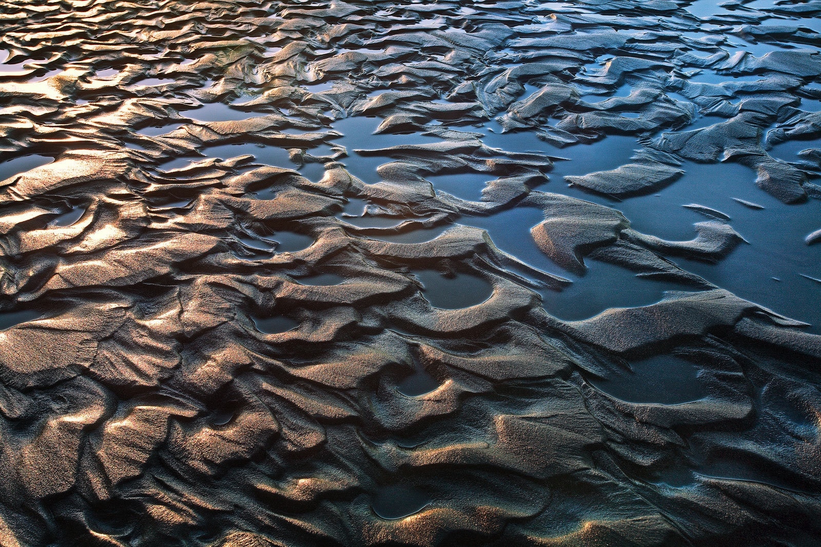 Silt and Sand #Patterns in Mclure's Beach during a low tide sunset. Mclure's Beach is in the northern peninsula in Point Reyes National Seashore.