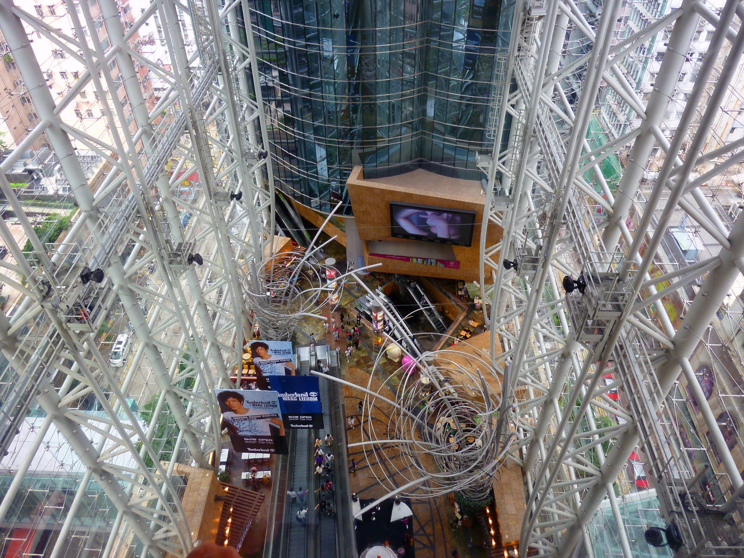 Langham Place, the largest mall in Mong Kok, Kowloon, Hong Kong.  It has a corkscrew design with over 200 stores and I believe more than thirteen floors (I lost count after the 12th).