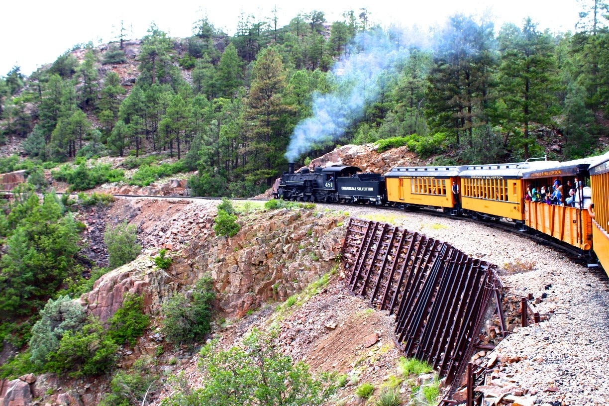 Our journey on the Durango Silverton Narrow Gauge Railroad was one of the best days of our Colorado road trip. With jaw-dropping vistas at every turn, it is one of the most scenic routes in the US. It's a must for every Colorado bucket list!

http://thetradingtravelers.com/traveling-through-time-on-the-narrow-gauge-railroad/
