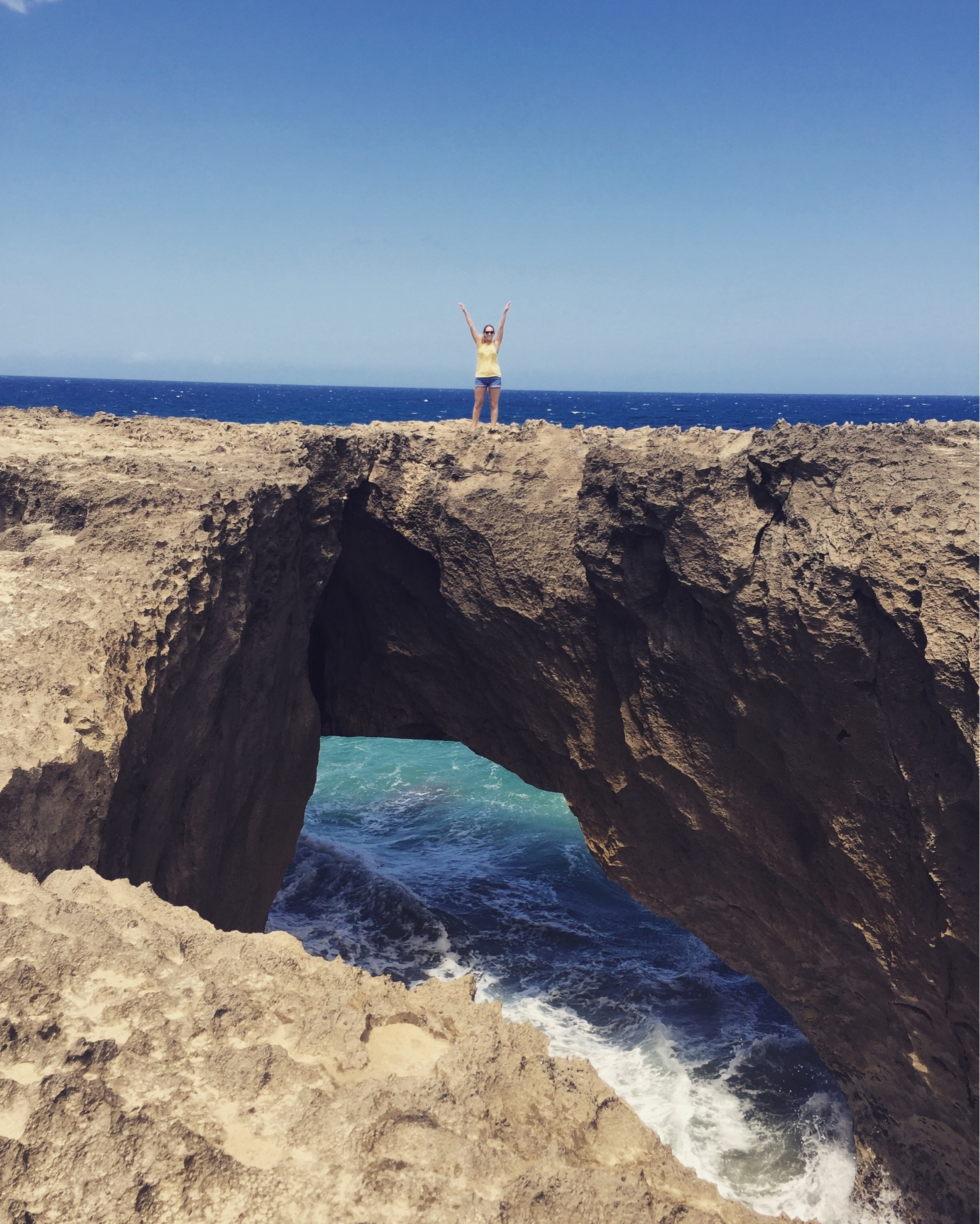 Playa Jobos in Puerto Rico had great $1 empanadas, lots of sun, and a really cool cliff! 