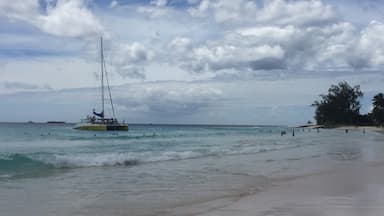 "Tiami" catamaran cruise anchors off Accra Beach for lunch and a swim.