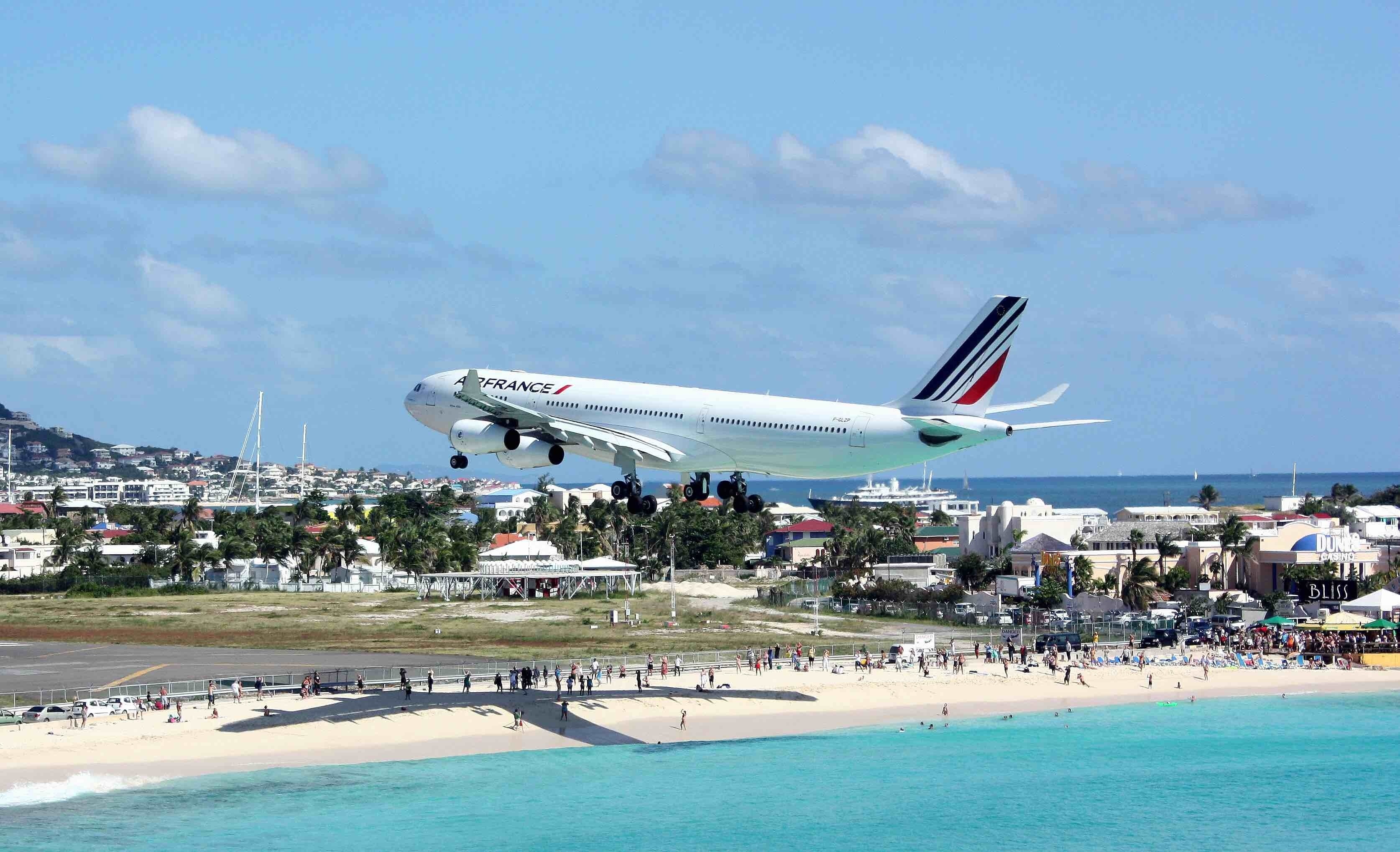 The famous Maho Beach on Saint Maarten. Great place for checking out aircraft landings up close while sitting on the beach. Took this picture from the hotel balcony shortly after I arrived. Spent a good part of the next day at the beach bar at far end of the beach. The flight schedule is posted on a surf board and whenever a plane was landing, everyone got up and walked onto the beach to have the plane fly overhead. The plane landed and then everyone went back to their beer...
#perspectives