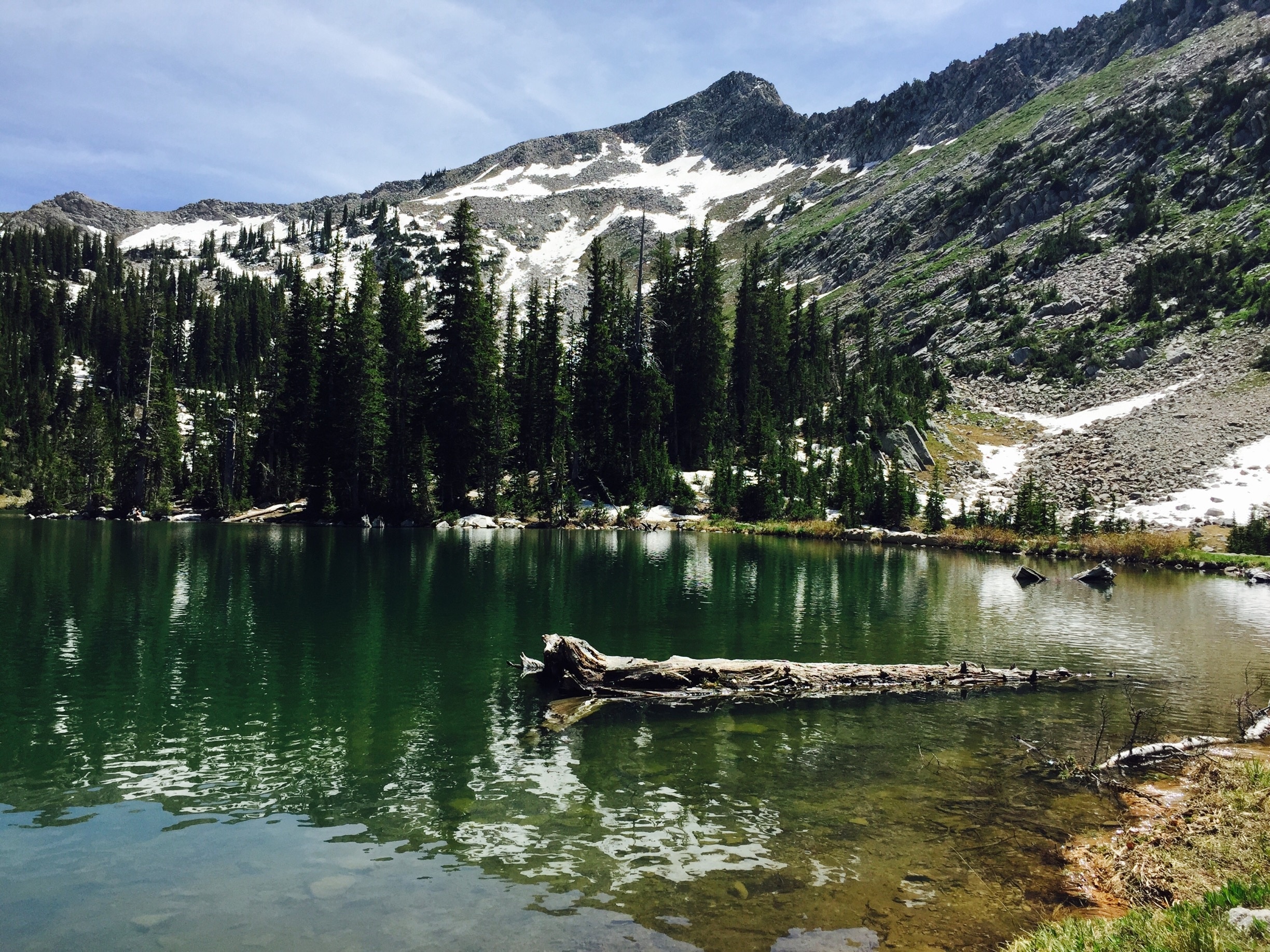 Red pine lake at 10000 feet in Wasatch national forest near Salt Lake City. Check out the glaciers on the mountain in the background. 
