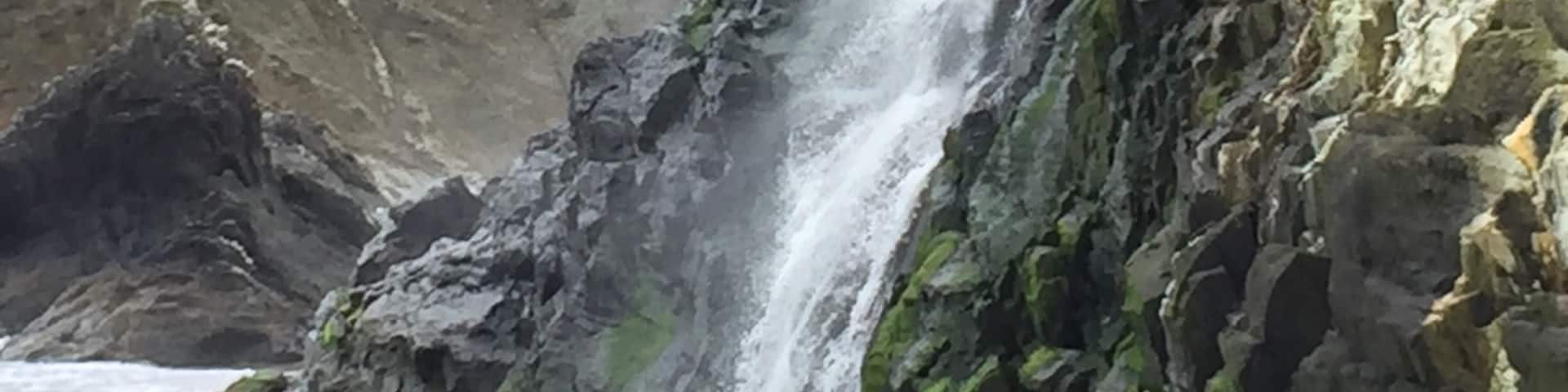 A stroll along the beach  led to a clamber across the rocks which led to stumbling into this gorgeous waterfall running into the sea!