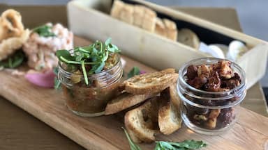 Scrumptious tapas at Le Bercail in Baie-Saint-Paul. One of two restaurants at Le Germain Hotel & Spa Charlevoix. Spiced nuts, shrimp with spicy mayonnaise and basil pesto bruschetta. A perfect little snack.
